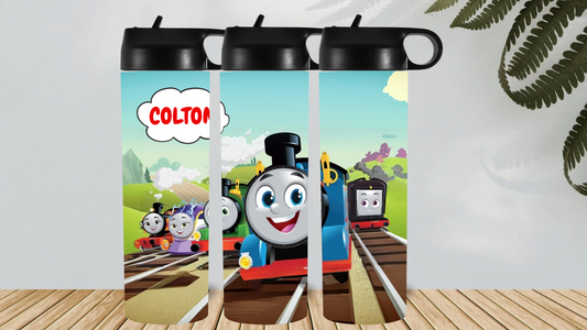 Two tumblers with cartoon train design and personalized name 'Colton' on a white background.